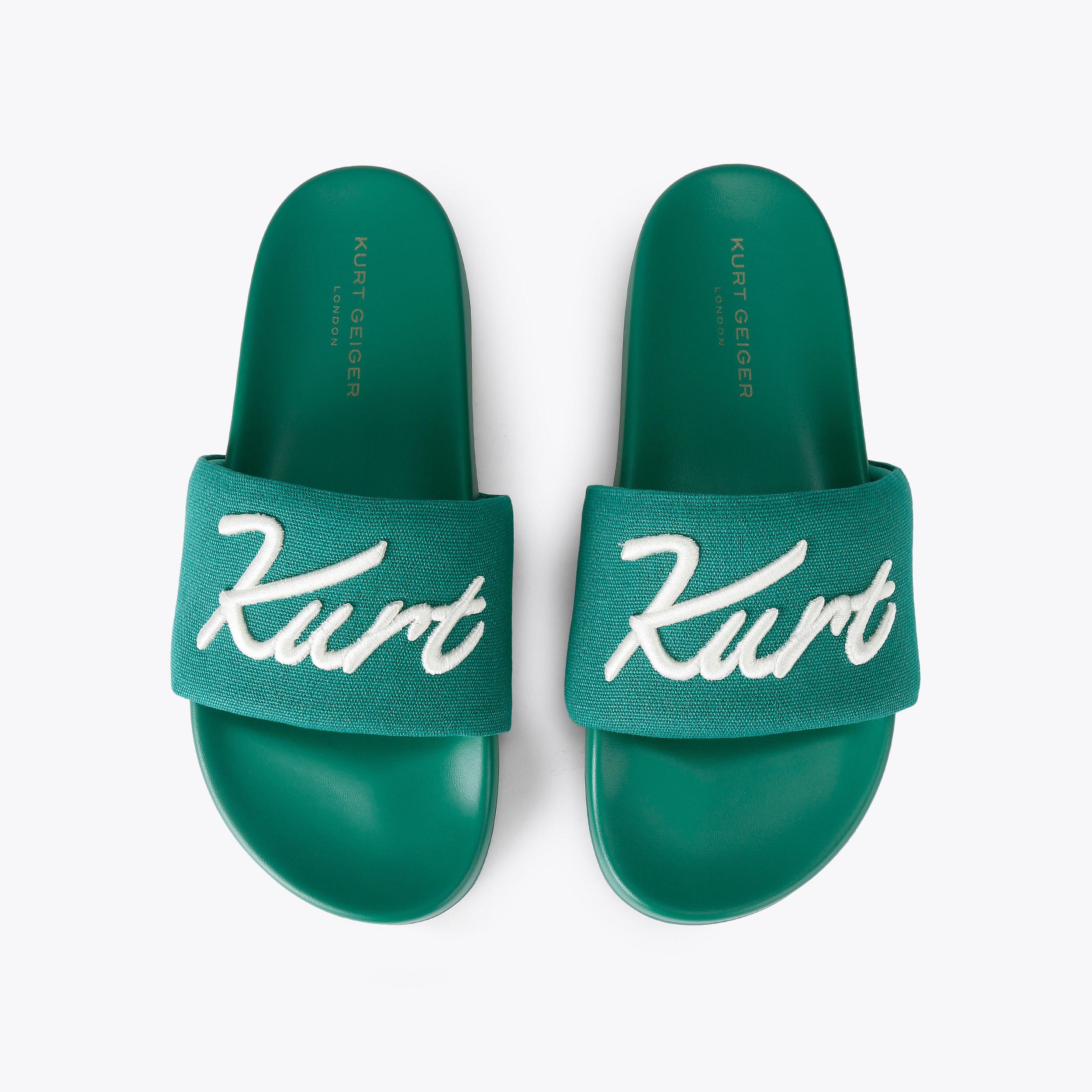 KC SCRIPT SLIDE Green Fabric Script Slide Sandal by Kurt Geiger London