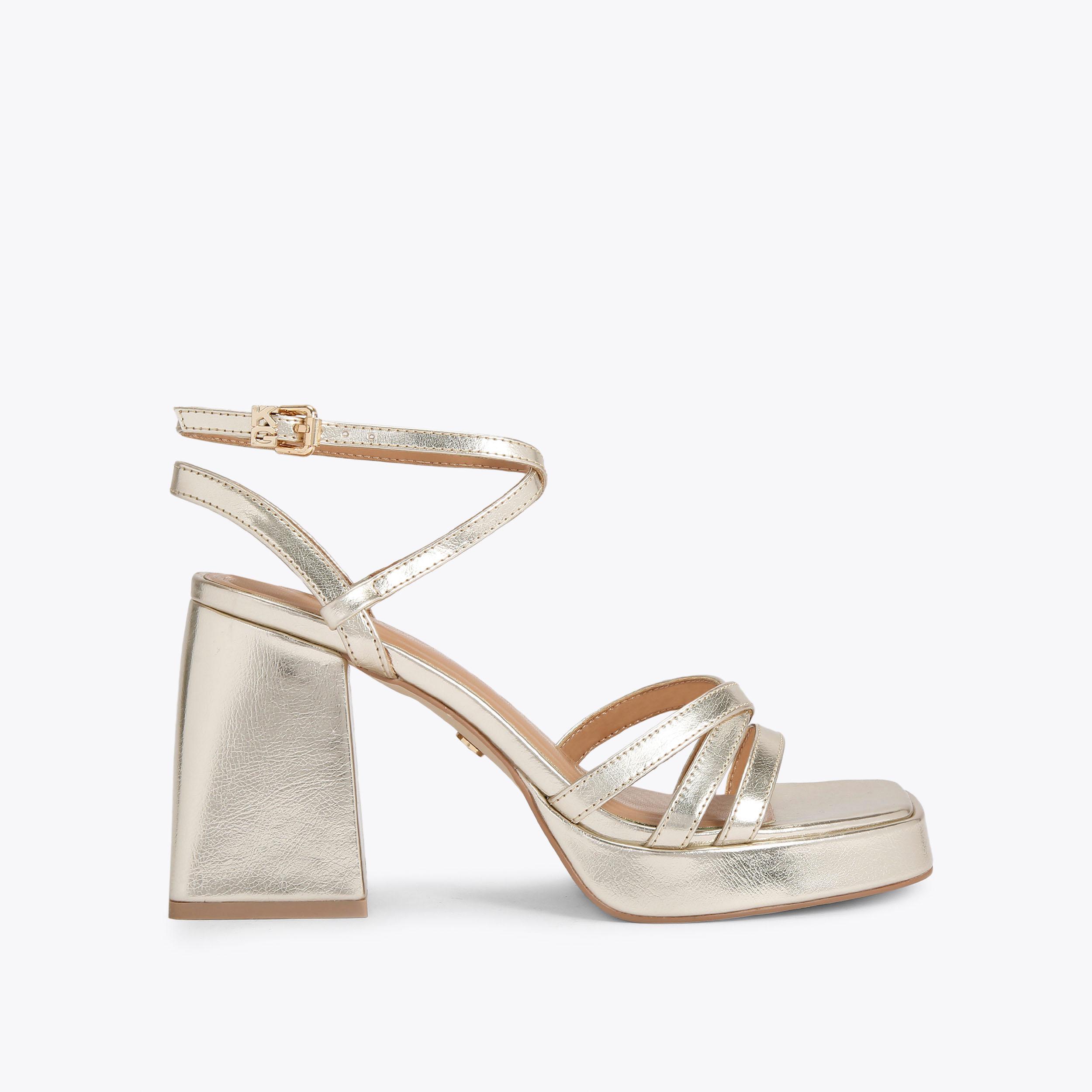 Kurt geiger gold 2025 block heel sandals