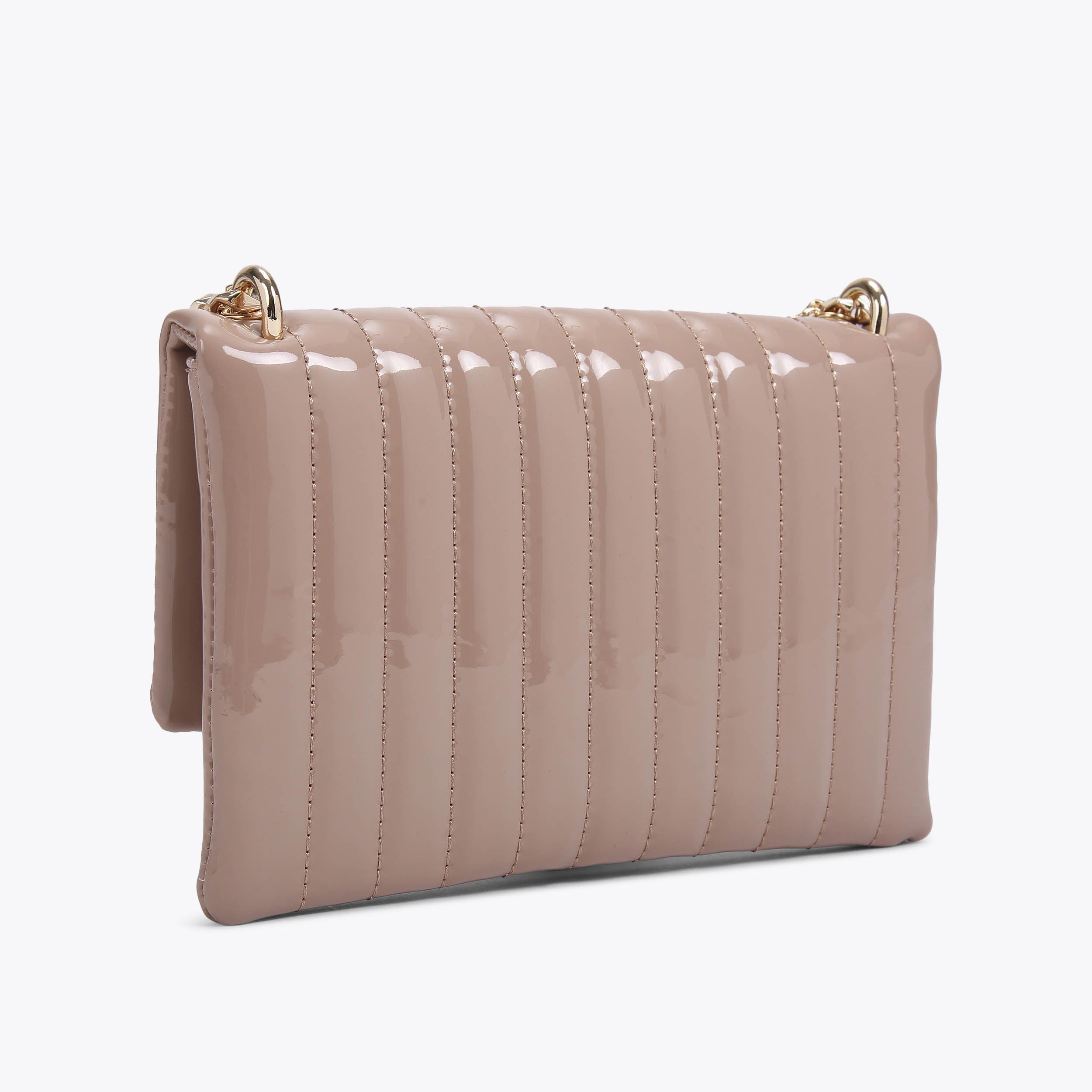 REBEL CLUTCH Blush Clutch Bag by CARVELA